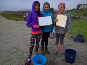 girls collecting trash