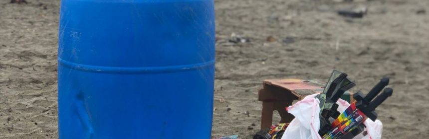 trash barrel filled with used fireworks