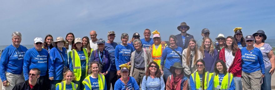 A group of Pacific Beach Coalition members stand together at EcoFest 2026